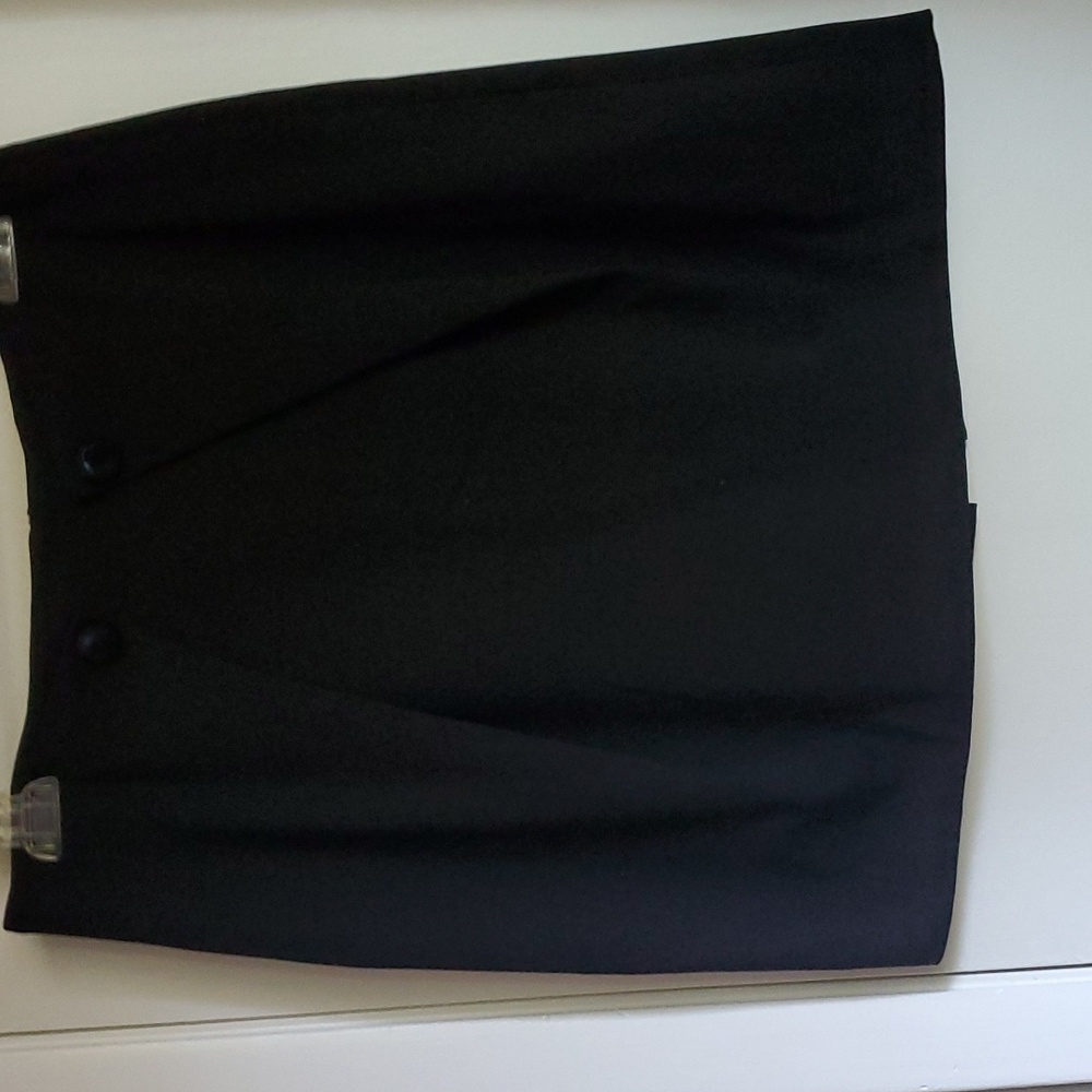 Skirt black with 2 bottom in front.